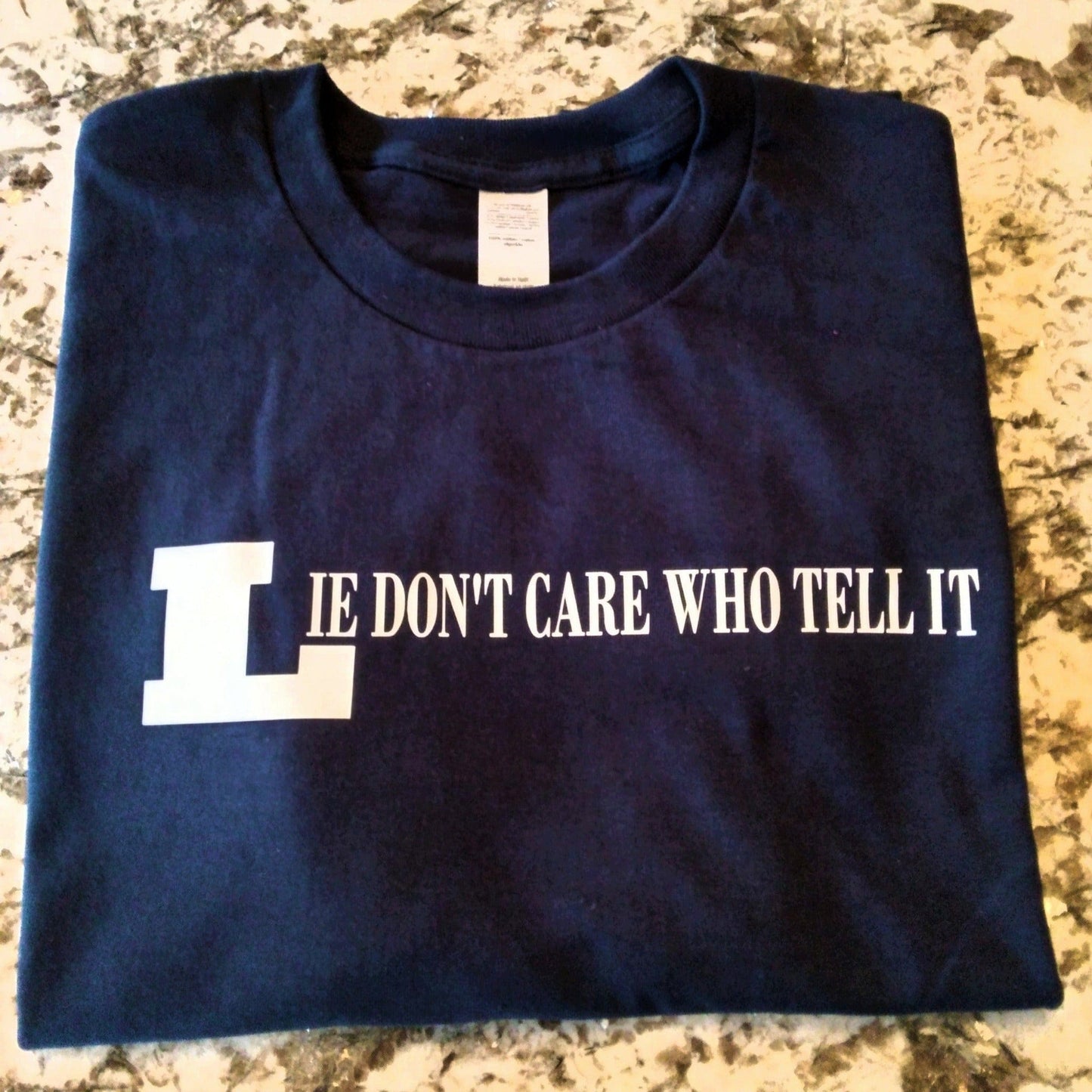 Lie Don't Care Who Tell It T-Shirt - Ward Shop Of Essentials