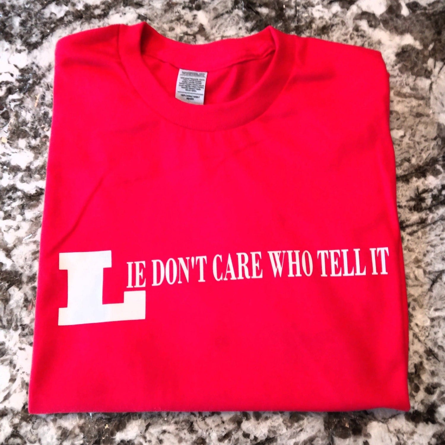 Lie Don't Care Who Tell It T-Shirt - Ward Shop Of Essentials