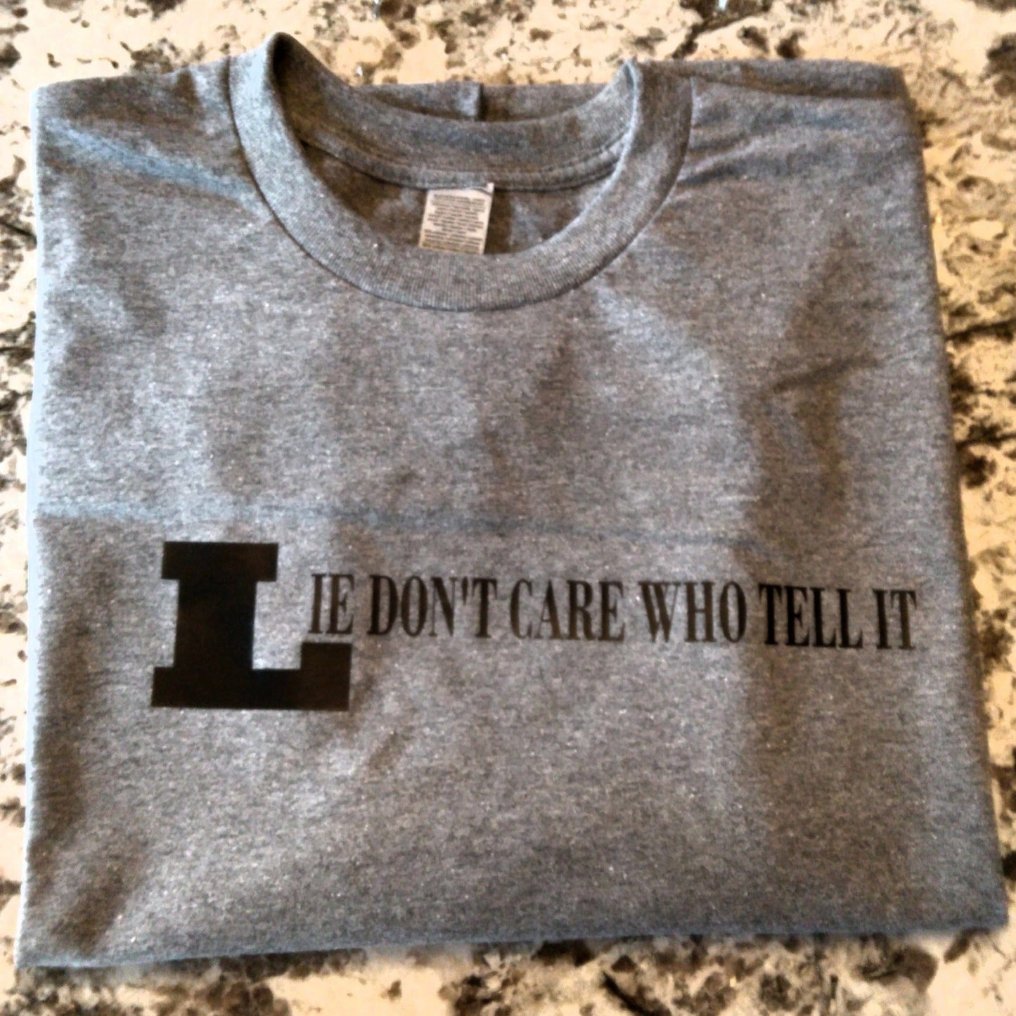 Lie Don't Care Who Tell It T-Shirt - Ward Shop Of Essentials