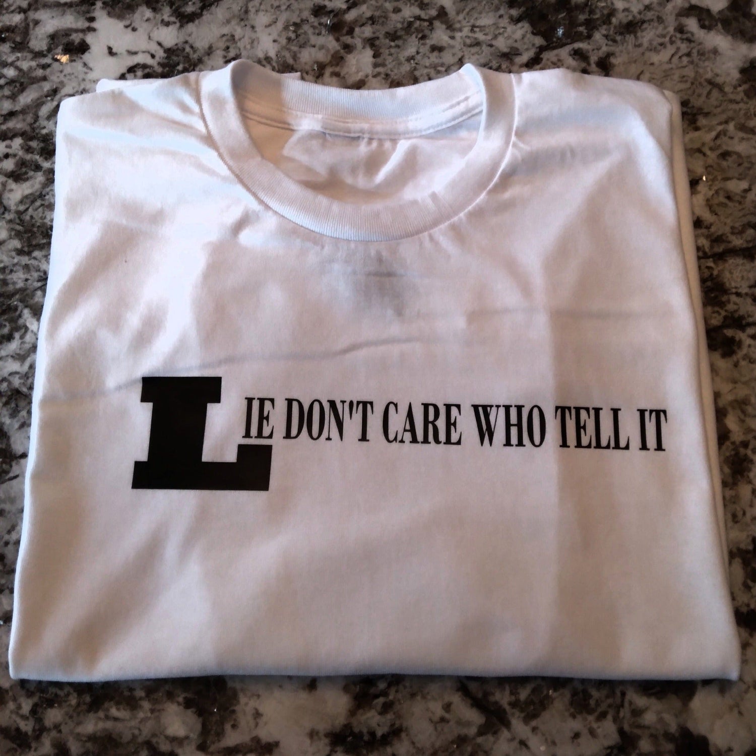 Lie Don't Care Who Tell It T-Shirt - Ward Shop Of Essentials