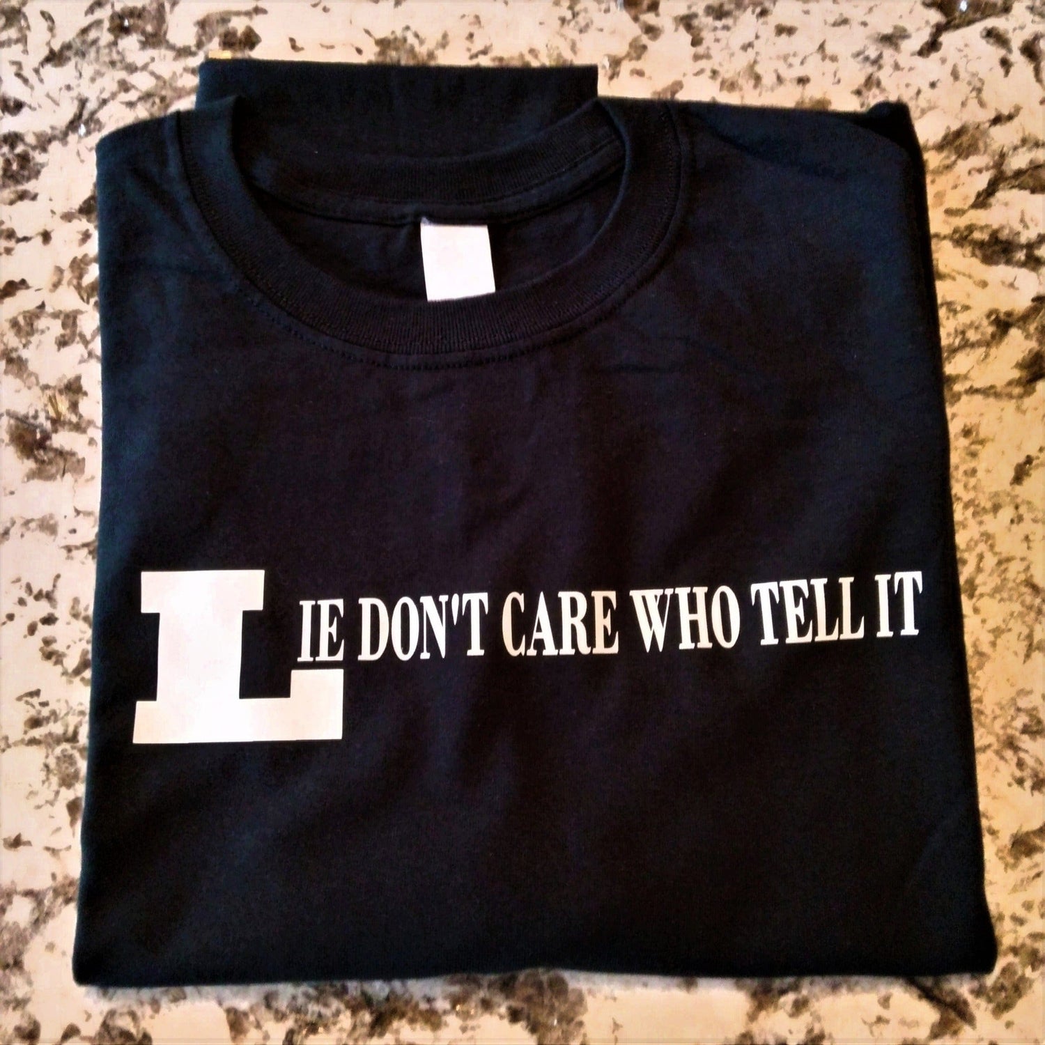 Lie Don't Care Who Tell It T-Shirt - Ward Shop Of Essentials